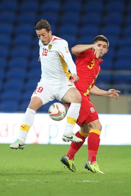 11013 - Wales v Macedonia, World Cup 2014 Qualifying - Wales' Declan John and Macedonia's Agim Ibraimi compete for the ball(c) Huw Evans Picture Agency, Cardiff