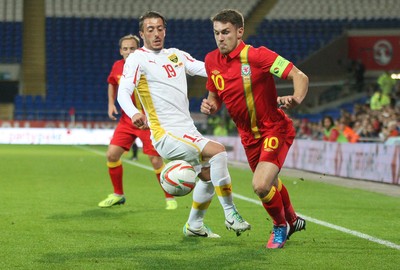 11013 - Wales v Macedonia, World Cup 2014 Qualifying - Wales' Aaron Ramsey gets away from Macedonia's Agim Ibraimi(c) Huw Evans Picture Agency, Cardiff
