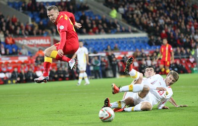 11013 - Wales v Macedonia, World Cup 2014 Qualifying - Wales' Craig Bellamy is tackled by Macedonia's Stefan Ristovski(c) Huw Evans Picture Agency, Cardiff