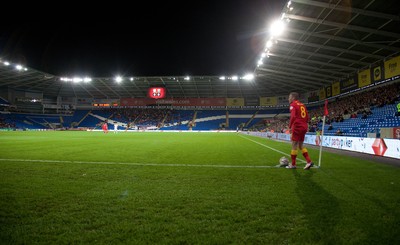 11013 - Wales v Macedonia, World Cup 2014 Qualifying - Wales' Craig Bellamy prepares to take a corner kick in front of a sparse crowd at the Cardiff City Stadium(c) Huw Evans Picture Agency, Cardiff
