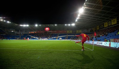 11013 - Wales v Macedonia, World Cup 2014 Qualifying - Wales' Craig Bellamy prepares to take a corner kick in front of a sparse crowd at the Cardiff City Stadium(c) Huw Evans Picture Agency, Cardiff
