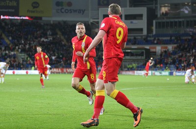 11013 - Wales v Macedonia, World Cup 2014 Qualifying - Wales' Simon Church celebrates with Craig Bellamy after scoring goal(c) Huw Evans Picture Agency, Cardiff