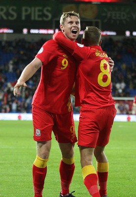 11013 - Wales v Macedonia, World Cup 2014 Qualifying - Wales' Simon Church celebrates with Craig Bellamy after scoring goal(c) Huw Evans Picture Agency, Cardiff