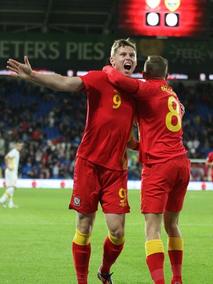 11013 - Wales v Macedonia, World Cup 2014 Qualifying - Wales' Simon Church celebrates with Craig Bellamy after scoring goal(c) Huw Evans Picture Agency, Cardiff