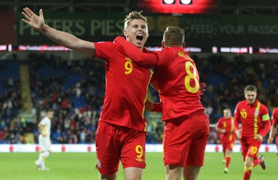 11013 - Wales v Macedonia, World Cup 2014 Qualifying - Wales' Simon Church celebrates with Craig Bellamy after scoring goal(c) Huw Evans Picture Agency, Cardiff
