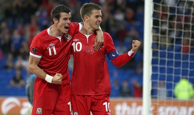 02.09.11 - Wales v Montenegro, Euro 2012 Qualifying -  Wales' Aaron Ramsey celebrates with Gareth Bale after scoring Wales' second goal  