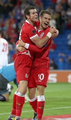 02.09.11 - Wales v Montenegro, Euro 2012 Qualifying -  Wales' Aaron Ramsey celebrates with Gareth Bale after scoring Wales' second goal  