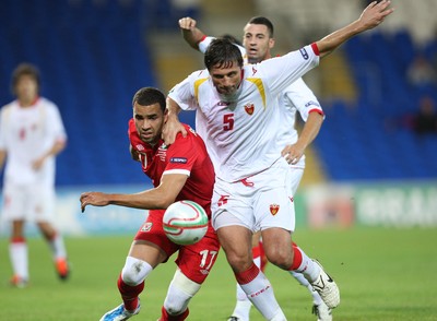 02.09.11 - Wales v Montenegro, Euro 2012 Qualifying -  Wales' Hal Robson-Kanu  and Montenegro's Radoslav Batak compete for the ball  