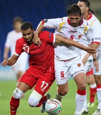 02.09.11 - Wales v Montenegro, Euro 2012 Qualifying -  Wales' Hal Robson-Kanu  and Montenegro's Radoslav Batak compete for the ball  