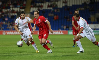 02.09.11 - Wales v Montenegro, Euro 2012 Qualifying -  Wales' David Vaughan pushes forward  