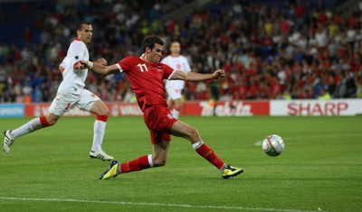02.09.11 - Wales v Montenegro, Euro 2012 Qualifying -  Wales' Gareth Bale crosses the ball  