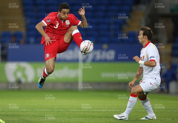 02.09.11 - Wales v Montenegro, Euro 2012 Qualifying -  Wales' Neil Taylor wins the ball 