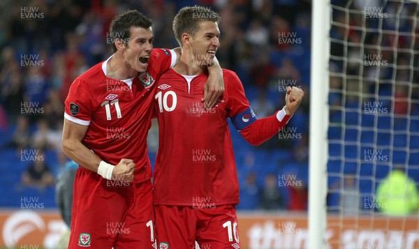 02.09.11 - Wales v Montenegro, Euro 2012 Qualifying -  Wales' Aaron Ramsey celebrates with Gareth Bale after scoring Wales' second goal  