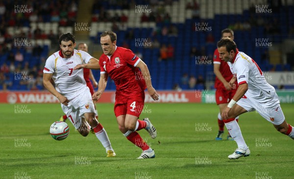 02.09.11 - Wales v Montenegro, Euro 2012 Qualifying -  Wales' David Vaughan pushes forward  