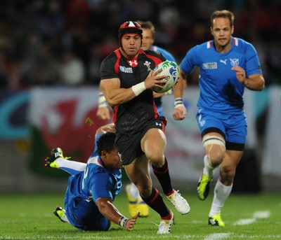 26.09.11 - Wales v Namibia - Rugby World Cup 2011 - Leigh Halfpenny of Wales gets into space. 