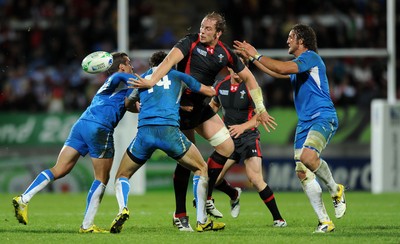 26.09.11 - Wales v Namibia - Rugby World Cup 2011 - Alun Wyn Jones of Wales is tackled by Danie Van Wyk of Namibia. 