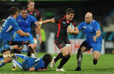 26.09.11 - Wales v Namibia - Rugby World Cup 2011 - Scott Williams of Wales is tackled by Danie Van Wyk of Namibia. 