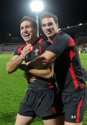 26.09.11 - Wales v Namibia - Rugby World Cup 2011 - Stephen Jones and George North of Wales celebrate at the end of the game. 