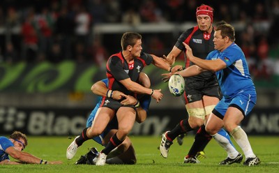 26.09.11 - Wales v Namibia - Rugby World Cup 2011 - Tavis Knoyle of Wales tries to get the ball away. 