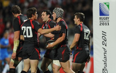 26.09.11 - Wales v Namibia - Rugby World Cup 2011 - Jonathan Davies of Wales celebrates his try with team mates. 