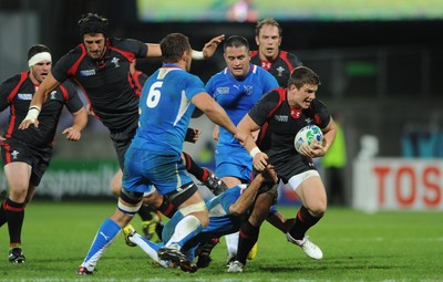 26.09.11 - Wales v Namibia - Rugby World Cup 2011 - Scott Williams of Wales is tackled by Danie Van Wyk of Namibia. 