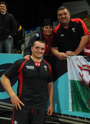 26.09.11 - Wales v Namibia - Rugby World Cup 2011 - Ken Owens of Wales with his parents after winning his first Wales cap. 