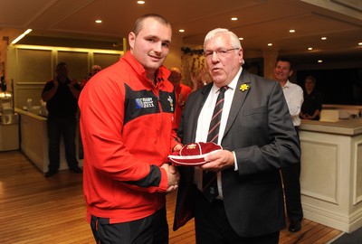 26.09.11 - Wales v Namibia - Rugby World Cup 2011 - Ken Owens of Wales is presented with his first Welsh cap by WRU President Dennis Gethin. 