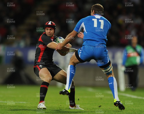 26.09.11 - Wales v Namibia - Rugby World Cup 2011 - Leigh Halfpenny of Wales takes on Danie Dames of Namibia. 
