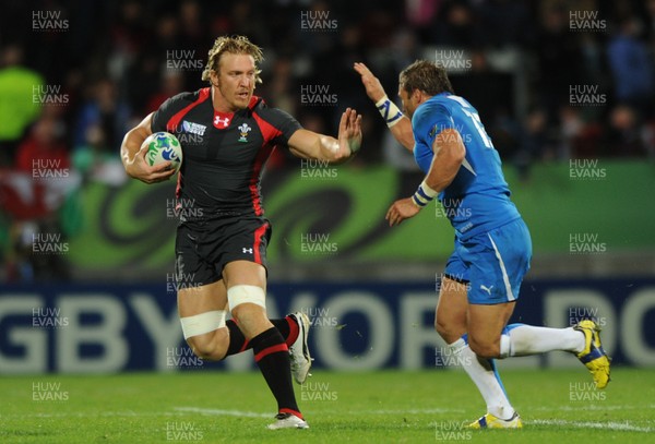 26.09.11 - Wales v Namibia - Rugby World Cup 2011 - Andy Powell of Wales is tackled by Piet Van Zyl of Namibia. 
