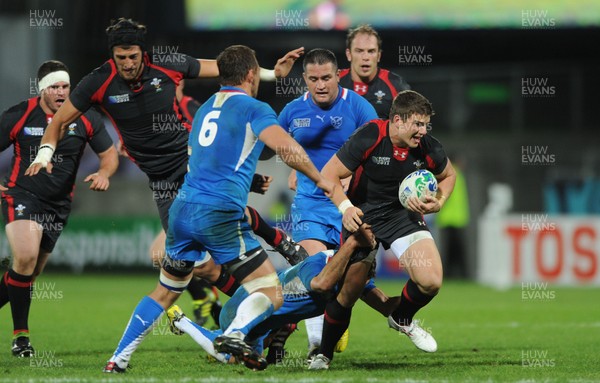 26.09.11 - Wales v Namibia - Rugby World Cup 2011 - Scott Williams of Wales is tackled by Danie Van Wyk of Namibia. 
