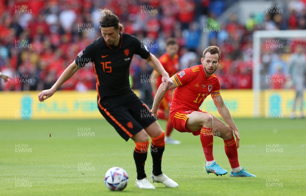 080622 - Wales v Netherlands, UEFA Nations League - Hans Hateboer of Netherlands is challenged by Rhys Norrington-Davies of Wales