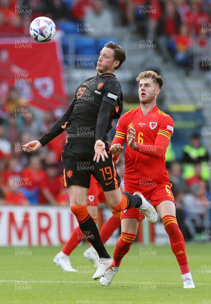 080622 - Wales v Netherlands, UEFA Nations League - Wout Weghorst of Netherlands is challenged by Joe Rodon of Wales