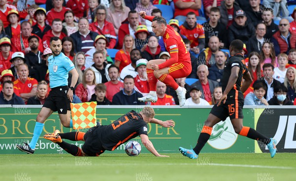 080622 - Wales v Netherlands, UEFA Nations League - Connor Roberts of Wales is challenged by Matthijs De Ligt of Netherlands