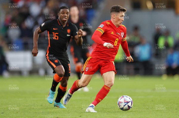 080622 - Wales v Netherlands, UEFA Nations League - Harry Wilson of Wales is challenged by Tyrell Malacia of Netherlands