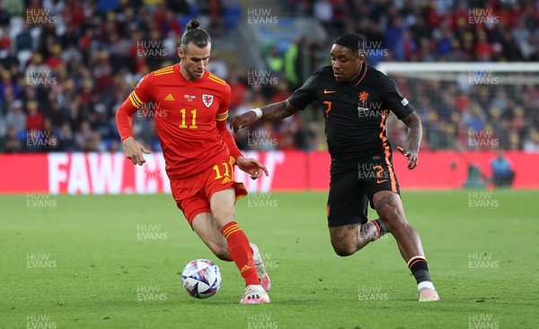080622 - Wales v Netherlands, UEFA Nations League - Gareth Bale of Wales is challenged by Steven Bergwijn of Netherlands