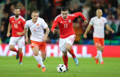 131115 - Wales v Netherlands, Vauxhall International Friendly - Tom Lawrence of Wales gets away from Jordy Clasie of Netherlands