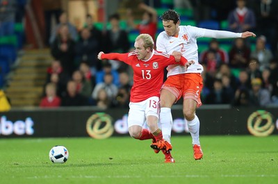 131115 - Wales v Netherlands, Vauxhall International Friendly - Jonathan Williams of Wales takes on Daryl Janmaat of Netherlands