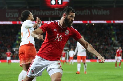 131115 - Wales v Netherlands, Vauxhall International Friendly - Joe Ledley of Wales celebrates scoring after Joe Allen of Wales has his penalty shot saved by Netherlands goalkeeper Jasper Cillessen
