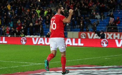 131115 - Wales v Netherlands, Vauxhall International Friendly - Joe Ledley of Wales celebrates scoring after Joe Allen of Wales has his penalty shot saved by Netherlands goalkeeper Jasper Cillessen