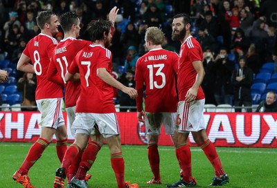 131115 - Wales v Netherlands, Vauxhall International Friendly - Joe Ledley of Wales celebrates scoring after Joe Allen of Wales has his penalty shot saved by Netherlands goalkeeper Jasper Cillessen