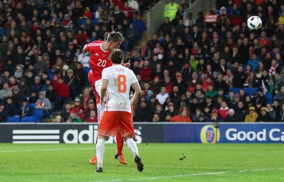 131115 - Wales v Netherlands, Vauxhall International Friendly - Emyr Huws of Wales heads to score Wales' second goal