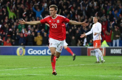 131115 - Wales v Netherlands, Vauxhall International Friendly - Emyr Huws of Wales celebrates after scoring Wales' second goal