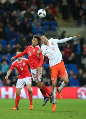 131115 - Wales v Netherlands, Vauxhall International Friendly - Adam Henley of Wales and Bas Dost of Netherlands compete for the ball