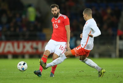 131115 - Wales v Netherlands, Vauxhall International Friendly - Joe Ledley of Wales plays the ball past Jeffery Bruma of Netherlands