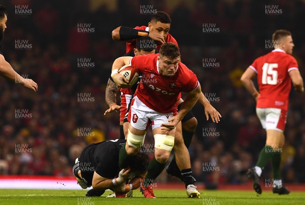 051122 - Wales v New Zealand - Autumn Nations Series - Will Rowlands of Wales is tackled by Samuel Whitelock of New Zealand