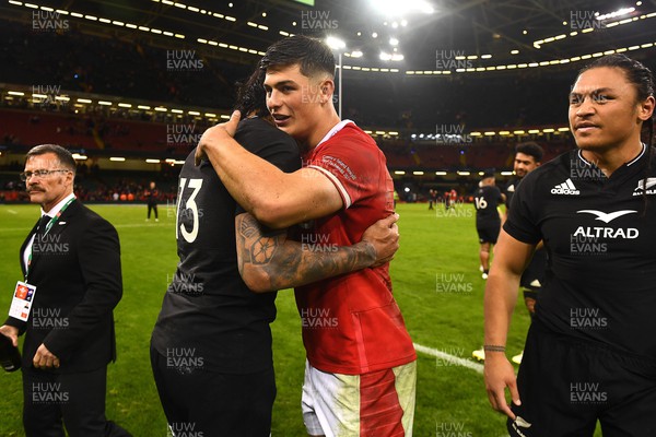 051122 - Wales v New Zealand - Autumn Nations Series - Rieko Ioane of New Zealand and Louis Rees-Zammit of Wales at the end of the game