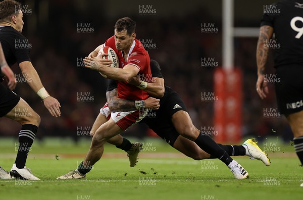 051122 - Wales v New Zealand - Autumn International Series - Tomos Williams of Wales is tackled by Rieko Ioane of New Zealand
