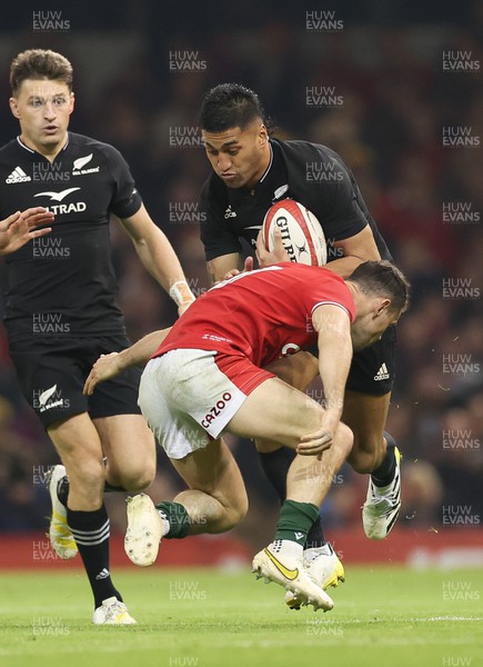 051122 - Wales v New Zealand, Autumn Nations Series - Rieko Ioane of New Zealand takes on Tomos Williams of Wales