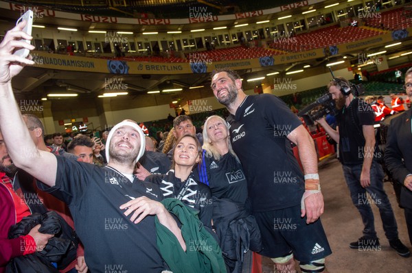 051122 - Wales v New Zealand - Autumn Nations Series - Samuel Whitelock of New Zealand poses for photos and signs autographs with fans