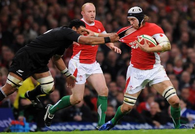 07.11.09 - Wales v New Zealand - Invesco Perpetual Series 2009 - Ryan Jones of Wales takes on the All Blacks defence. 